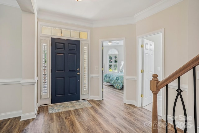 2607 Old Ashworth Ln NW, Concord, NC 28027 - entrance foyer with wood finished floors, stairs, and ornamental molding