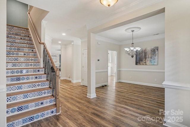 2607 Old Ashworth Ln NW, Concord, NC 28027 - staircase with wood finished floors, a chandelier, crown molding, and recessed lighting