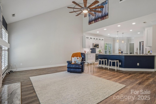 2607 Old Ashworth Ln NW, Concord, NC 28027 - living room featuring high vaulted ceiling, a ceiling fan, dark wood-style floors, and recessed lighting