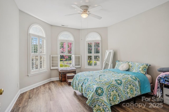 2607 Old Ashworth Ln NW, Concord, NC 28027 - bedroom with wood finished floors and a ceiling fan