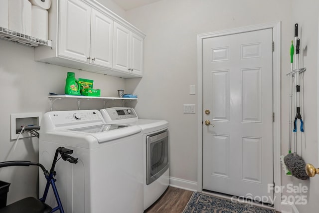 2607 Old Ashworth Ln NW, Concord, NC 28027 - laundry area featuring washer and clothes dryer, cabinet space, and dark wood-type flooring