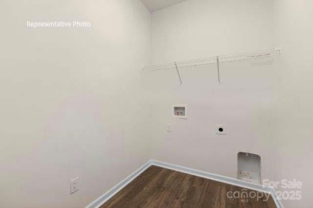 9235 Poquoson Dr, Gastonia, NC 28056 - laundry room featuring hookup for a washing machine, dark wood-style flooring, and hookup for an electric dryer