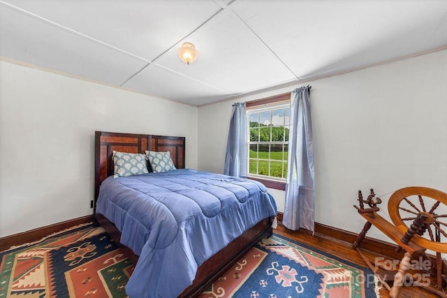 5215 Double Island Rd, Green Mountain, NC 28740 - bedroom with wood finished floors and ornamental molding