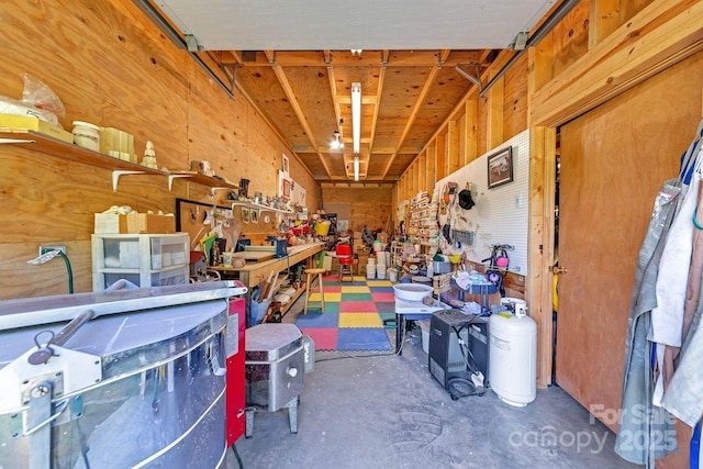 5215 Double Island Rd, Green Mountain, NC 28740 - garage with a workshop area and wooden walls