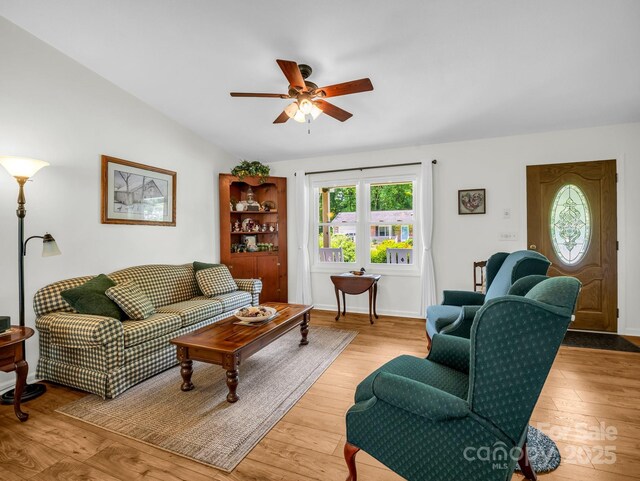 313 Resada Dr, Brevard, NC 28712 - living area featuring plenty of natural light, a ceiling fan, light wood finished floors, and lofted ceiling