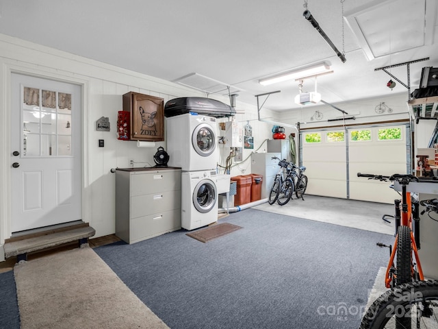 313 Resada Dr, Brevard, NC 28712 - garage with stacked washer / drying machine and a garage door opener
