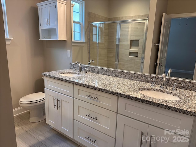 2261 Moss Haven Ln, Denver, NC 28037 - full bathroom with double vanity and a shower stall