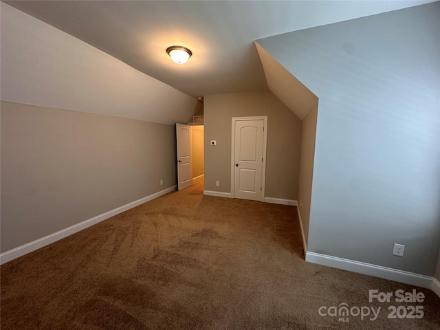 2261 Moss Haven Ln, Denver, NC 28037 - additional living space with carpet floors and vaulted ceiling