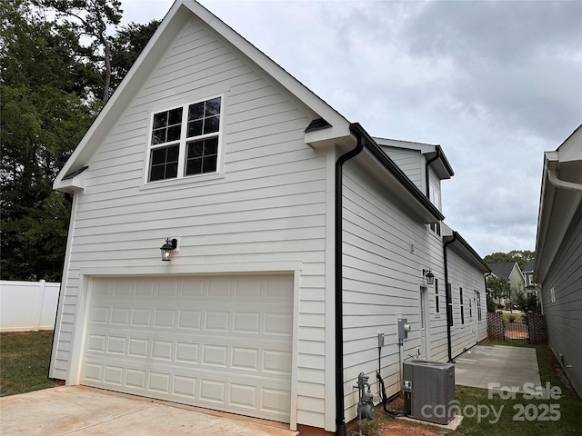 2261 Moss Haven Ln, Denver, NC 28037 - view of side of home featuring a garage and concrete driveway