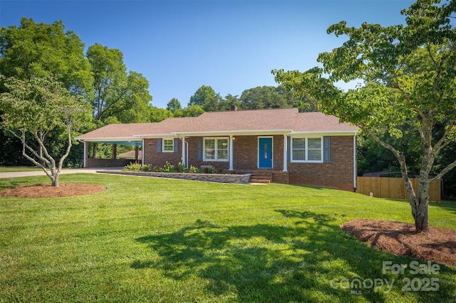 207 Valdese Dr, Morganton, NC 28655 - ranch-style home with an attached carport, brick siding, and concrete driveway