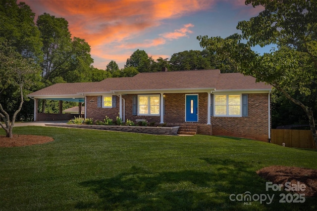 207 Valdese Dr, Morganton, NC 28655 - ranch-style home with brick siding and an attached carport