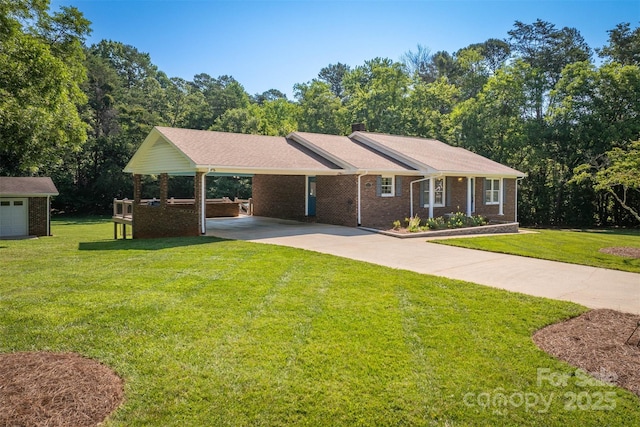 207 Valdese Dr, Morganton, NC 28655 - view of front of home with driveway, an attached carport, a front yard, and brick siding