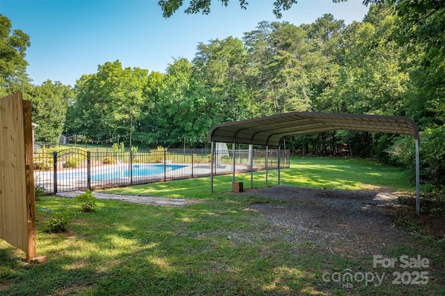 207 Valdese Dr, Morganton, NC 28655 - view of yard featuring driveway and a detached carport