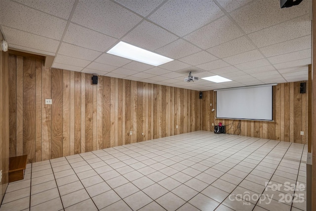 207 Valdese Dr, Morganton, NC 28655 - spare room with wooden walls and a drop ceiling