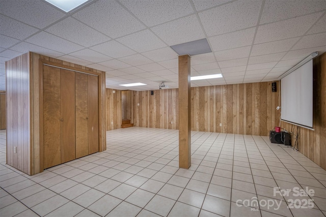 207 Valdese Dr, Morganton, NC 28655 - finished below grade area with wood walls, a drop ceiling, and light tile patterned floors