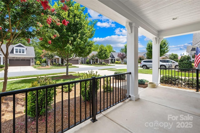 135 Valleymist Ln, Mooresville, NC 28117 - covered porch featuring a residential view