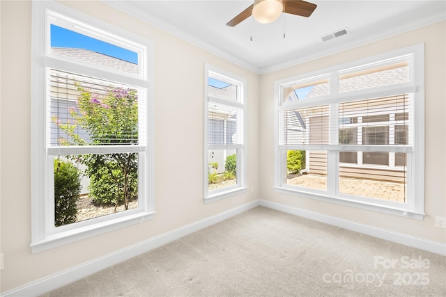 135 Valleymist Ln, Mooresville, NC 28117 - spare room featuring crown molding, light colored carpet, and ceiling fan