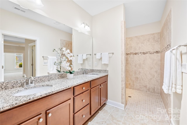 135 Valleymist Ln, Mooresville, NC 28117 - bathroom with double vanity, a walk in shower, and tile patterned flooring