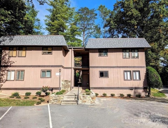 11 Lake Dr Unit B-1, Hendersonville, NC 28739 - view of building exterior with uncovered parking