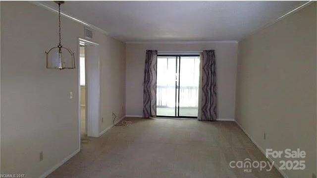 11 Lake Dr Unit B-1, Hendersonville, NC 28739 - spare room with baseboards