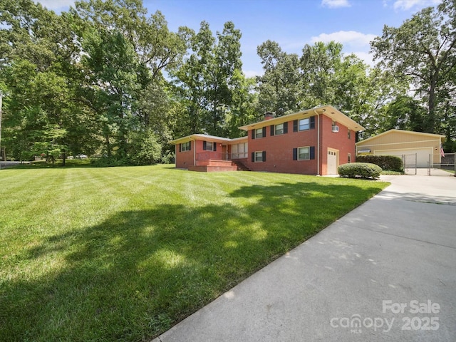 312 Garrison Dr, Albemarle, NC 28001 - view of green lawn with an outdoor structure