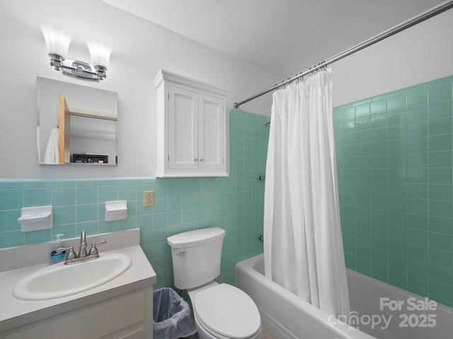 312 Garrison Dr, Albemarle, NC 28001 - bathroom with vanity, shower / tub combo, and tile walls