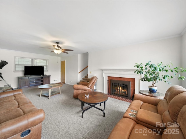 312 Garrison Dr, Albemarle, NC 28001 - living room featuring a ceiling fan, carpet floors, a fireplace, and stairs