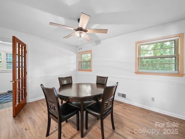 312 Garrison Dr, Albemarle, NC 28001 - dining space featuring light wood-style flooring and ceiling fan