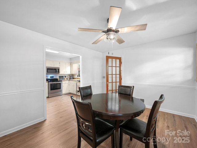 312 Garrison Dr, Albemarle, NC 28001 - dining area with ceiling fan and light wood-style flooring