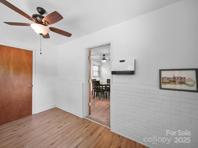 312 Garrison Dr, Albemarle, NC 28001 - spare room featuring a ceiling fan and wood finished floors