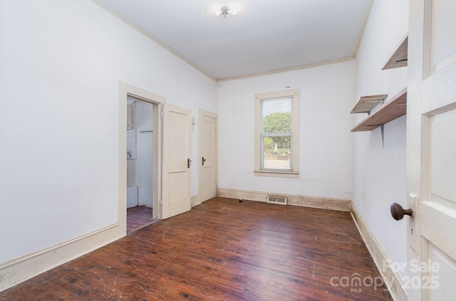 4712 Mooresville Rd, Salisbury, NC 28147 - unfurnished bedroom featuring hardwood / wood-style flooring and crown molding