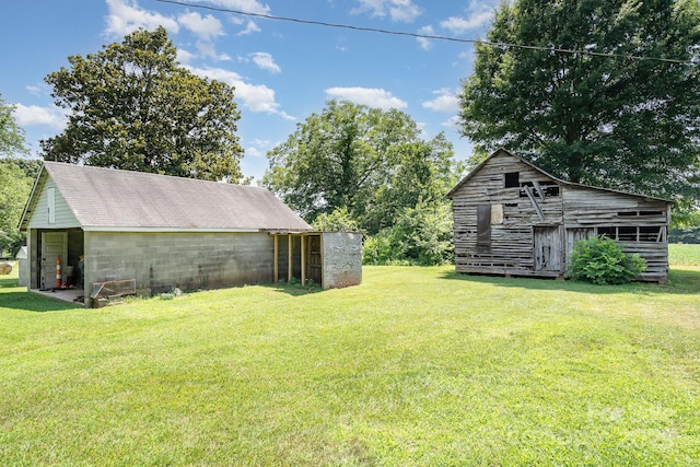 4712 Mooresville Rd, Salisbury, NC 28147 - view of grassy yard featuring an outbuilding
