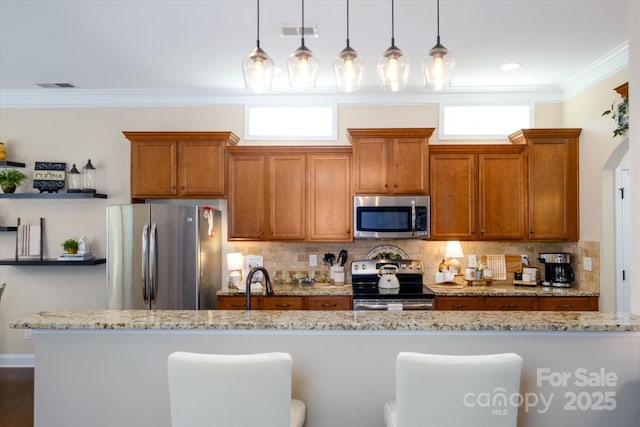 9122 Carneros Creek Rd Unit 25, Charlotte, NC 28214 - kitchen with appliances with stainless steel finishes, brown cabinetry, crown molding, and decorative backsplash