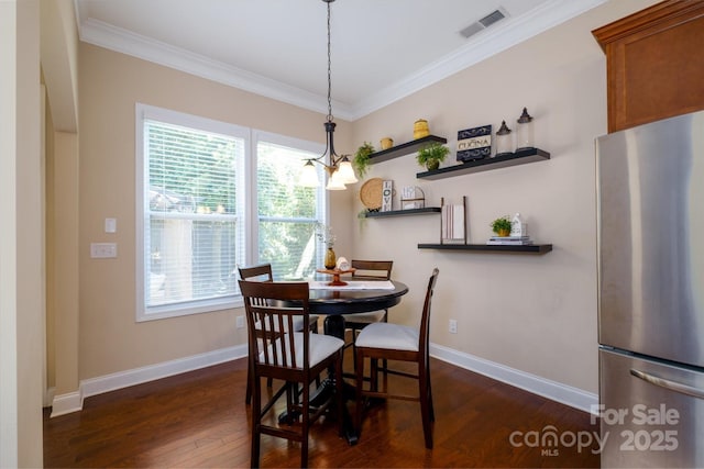 9122 Carneros Creek Rd Unit 25, Charlotte, NC 28214 - dining room featuring ornamental molding and dark wood-style floors