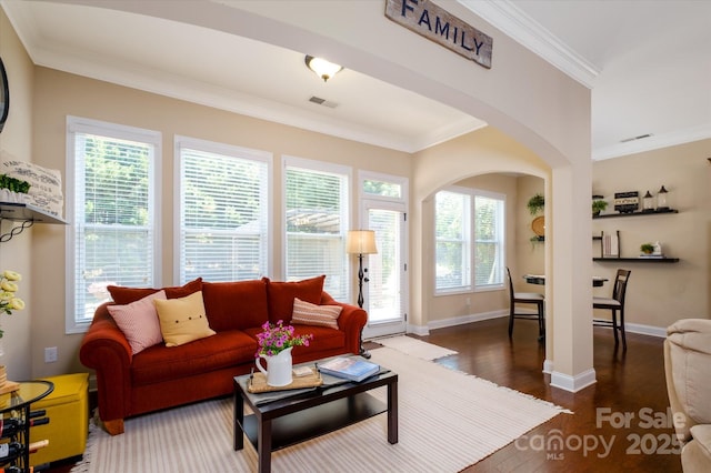 9122 Carneros Creek Rd Unit 25, Charlotte, NC 28214 - living room with arched walkways, ornamental molding, plenty of natural light, and wood finished floors