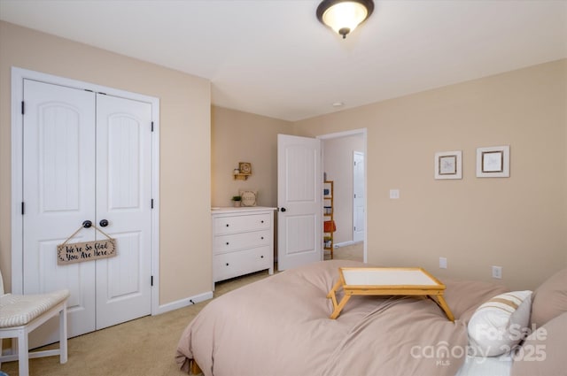 9122 Carneros Creek Rd Unit 25, Charlotte, NC 28214 - bedroom with light colored carpet and a closet