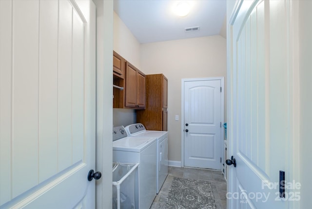 9122 Carneros Creek Rd Unit 25, Charlotte, NC 28214 - laundry area with cabinet space and separate washer and dryer