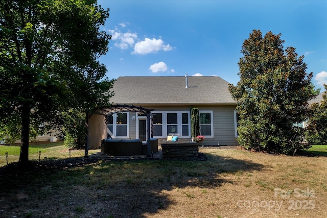 9122 Carneros Creek Rd Unit 25, Charlotte, NC 28214 - rear view of property with an outdoor hangout area, a pergola, a yard, and a shingled roof