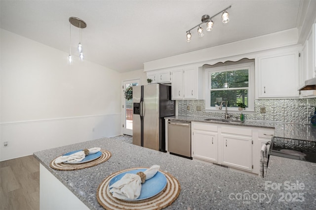 256 Timberland Loop, Mooresville, NC 28115 - kitchen with appliances with stainless steel finishes, white cabinets, and backsplash