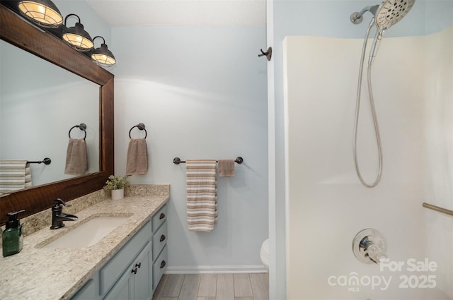 256 Timberland Loop, Mooresville, NC 28115 - full bathroom with vanity, a shower, and wood finished floors