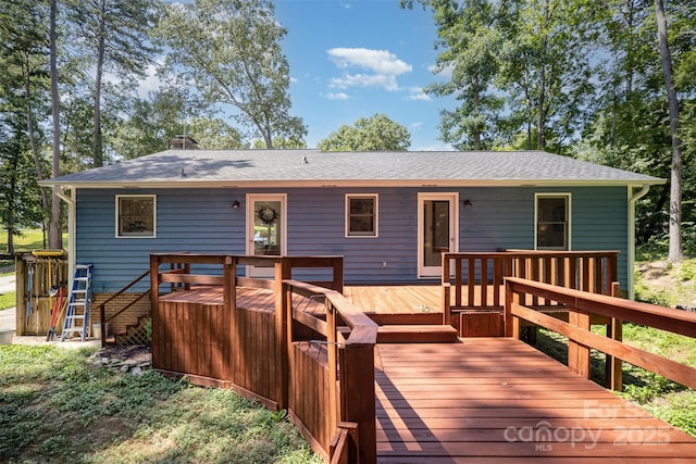 256 Timberland Loop, Mooresville, NC 28115 - rear view of property with a wooden deck, roof with shingles, and a chimney