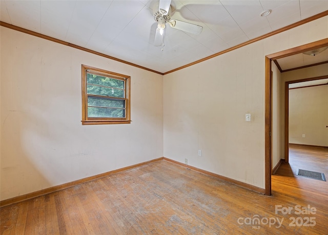 3575 Dellwood Rd, Waynesville, NC 28786 - spare room featuring hardwood / wood-style floors, crown molding, and a ceiling fan