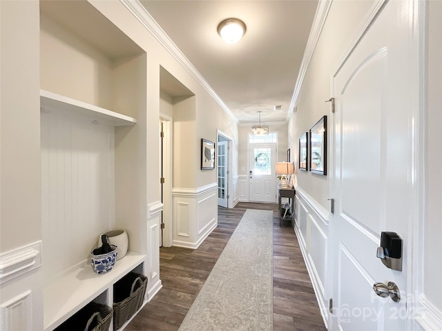 1024 Laggan Ln Unit 255, Indian Trail, NC 28079 - mudroom featuring a decorative wall, ornamental molding, a wainscoted wall, and dark wood finished floors