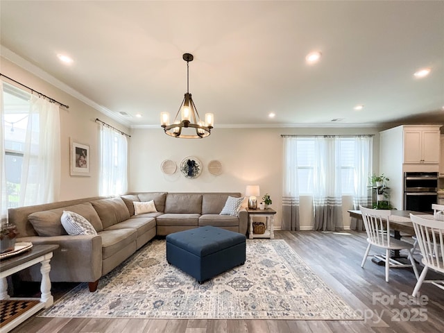 1024 Laggan Ln Unit 255, Indian Trail, NC 28079 - living room with a chandelier, recessed lighting, wood finished floors, and ornamental molding