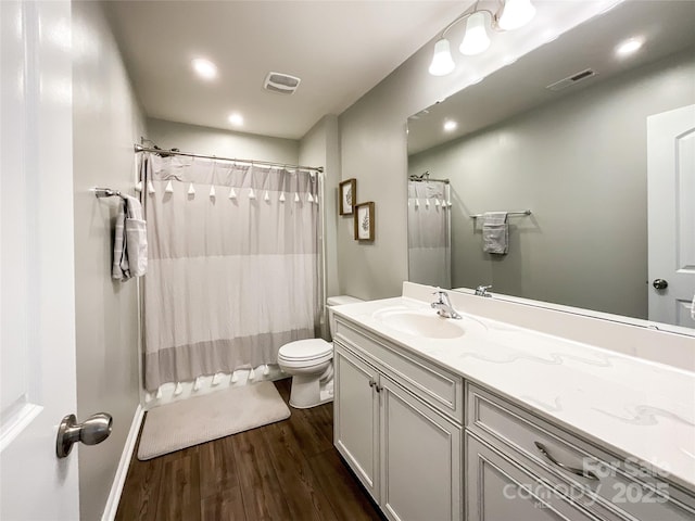 1024 Laggan Ln Unit 255, Indian Trail, NC 28079 - full bathroom with vanity, wood finished floors, shower / bathtub combination with curtain, and recessed lighting