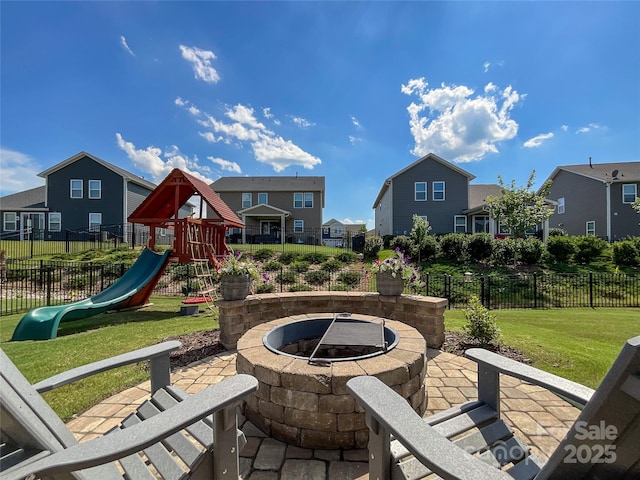 1024 Laggan Ln Unit 255, Indian Trail, NC 28079 - view of patio / terrace featuring a playground, a fire pit, and a residential view