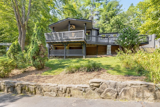 19 Timbers Edge Ln, Fairview, NC 28730 - rear view of property featuring a wooden deck and a lawn
