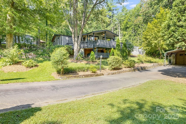 19 Timbers Edge Ln, Fairview, NC 28730 - view of front of house featuring driveway and a front lawn