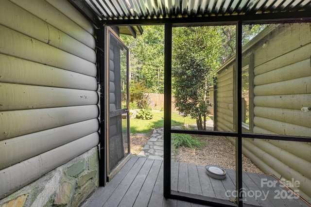 19 Timbers Edge Ln, Fairview, NC 28730 - doorway with rustic walls and hardwood / wood-style flooring