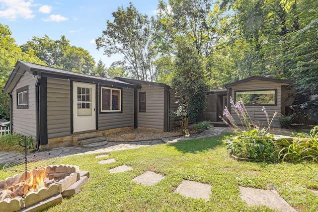 19 Timbers Edge Ln, Fairview, NC 28730 - view of outbuilding featuring entry steps and a fire pit